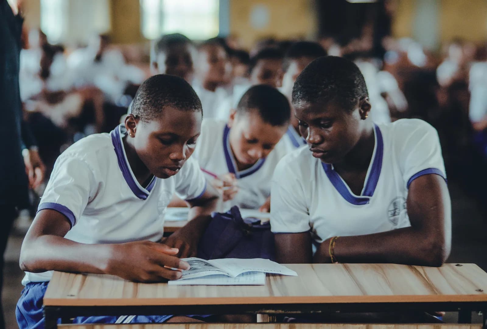 Students focused on their work in a classroom